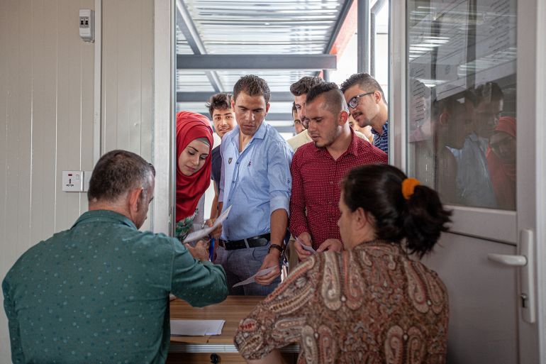 ERBIL, IRAQ - JUNE 16, 2016: Iraqi students at Hamdaniya University, a higher education institution relocated to Erbil following the Islamic State's seizure of swathes of Iraq's territory in 2014.; Shutterstock ID 2606327633; purchase_order: aj; job: ; client: ; other:
