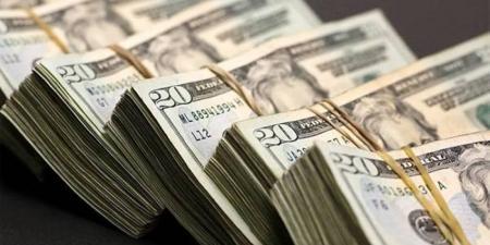 الدولار يتراجع لأدنى مستوى في 4 سنوات - الكويت الاخباري