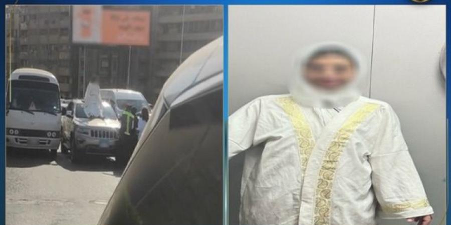 تفاصيل قيام فتاة بإعتلاء سيارة أعلى كوبرى أكتوبر بالقاهرة فيديو - الكويت الاخباري