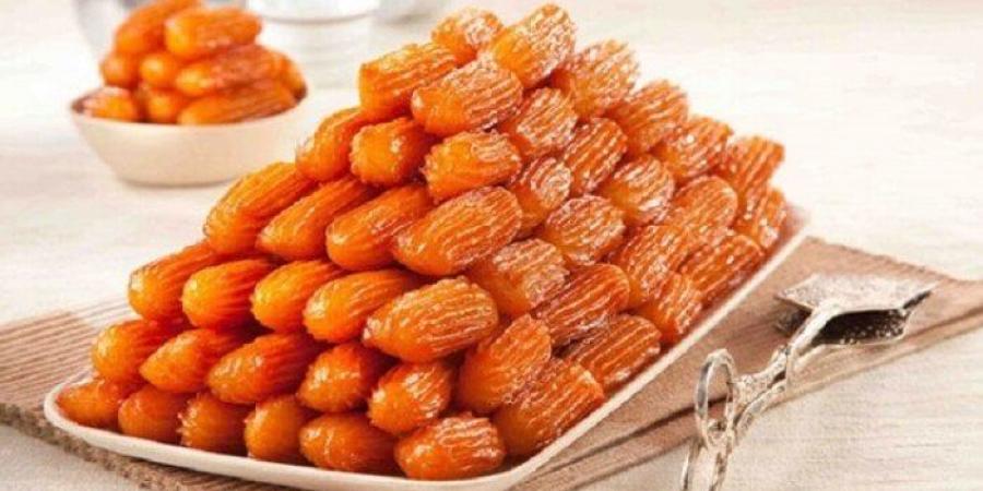حلوى شامية لذيذة.. طريقة عمل بلح الشام بخطوات بسيطة - الكويت الاخباري